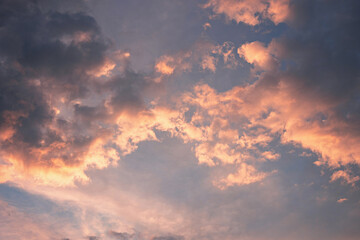 Gray and pink clouds in the evening sky
