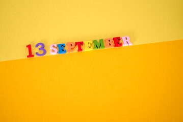 September 13 on a yellow background with room for text.