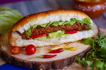 seekh kabab shawarma roll , tomato sauce and drink top view of arabic street food on wooden...