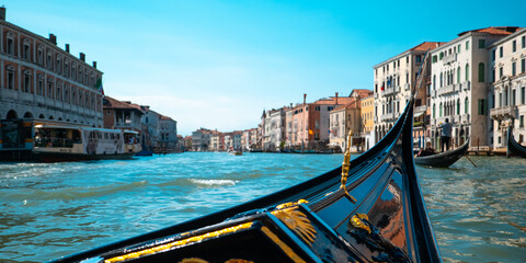 Fototapeta na wymiar View from the gondola flowing through the Venetian canals
