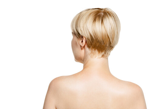Image of female back isolated over white studio background. Medical massage treatment of spine illness