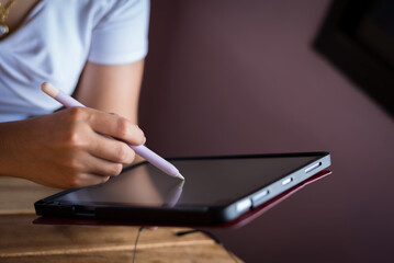 Woman hands holding stylus pen and using smartphone, business and technology concept.