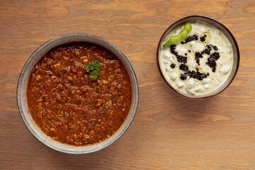Sprouted Horse Gram Kurma (Korma) and Mogri Raita tempered with black mustard seeds and oil.