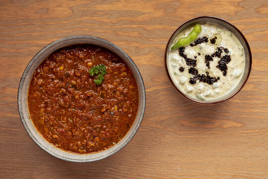 Sprouted Horse Gram Kurma (Korma) and Mogri Raita tempered with black mustard seeds and oil.
