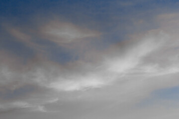 Light gray clouds soft against the sky nature weather atmosphere background