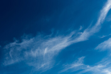 Naklejka na ściany i meble Dark blue sky atmosphere with white air clouds weather wind nature background