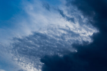 Naklejka na ściany i meble Dark blue sky nature white clouds background weather wind air atmosphere