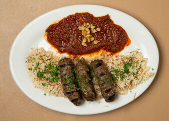 Beef kabobs over rice