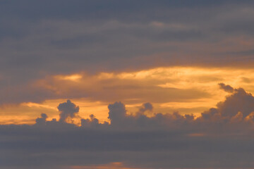 Obraz na płótnie Canvas Sunset sky orange yellow clouds background nature in the evening landscape