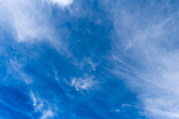 Fototapeta na wymiar Blue sky natural background with white clouds weather change wind nature