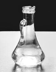 the water in the glass vessel is poured