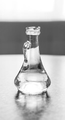 the water in the glass vessel is poured