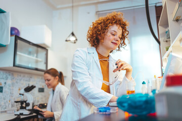 Shot of a young scientist conducting an experiment in a laboratory. Medical healthcare technology...