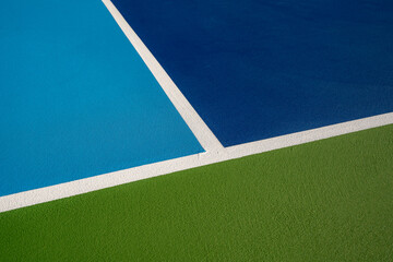 Example image of a newly surfaced, empty pickleball court with multi-color surface and white lines.
 - obrazy, fototapety, plakaty