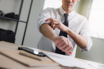 Businessman rolling up his sleeves on desk, concept of motivation, start-up, Corporate man,personnel working in office