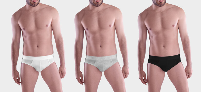 Mockup of white, black, heather brief on muscular guy, front view, isolated on background in studio.