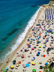 Italian beaches with tourists top view