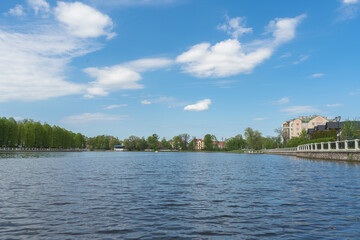 Fototapeta premium view from pond Verhniy on cityscape of Kaliningrad
