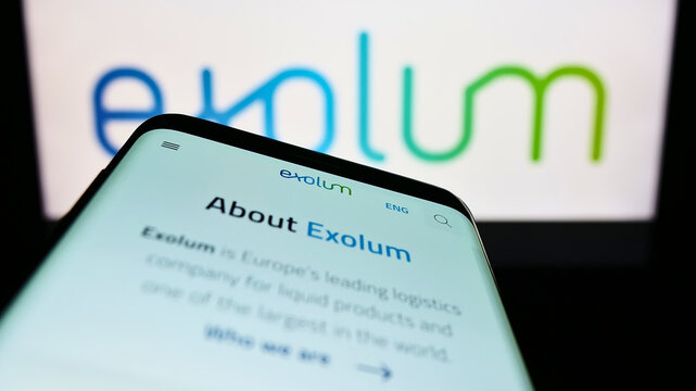 Stuttgart, Germany - 07-24-2022: Smartphone with website of Spanish energy company Exolum Group on screen in front of business logo. Focus on top-left of phone display.