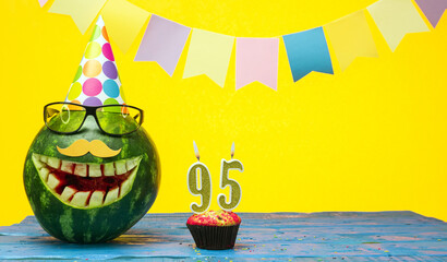  Funny watermelon in festive garlands for happy birthday greetings funny. Copy space watermelon...