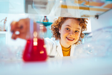 Female scientist working in the lab. A female medical or scientific researcher or woman doctor...