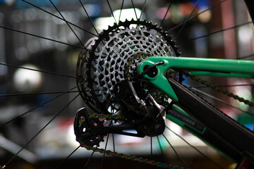 Closeup of a bicycle gears mechanism and chain on the star wheel of mountain bike. Rear wheel...