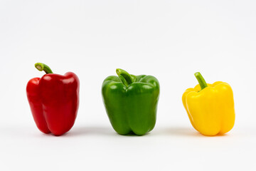 Bell pepper isolated on a white background. Salad fresh pepper yellow, green and red color