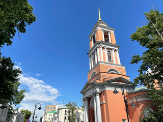Fototapeta na wymiar The church with the bell tower of the Life - Giving Trinity in Vishnyaki. Moscow, Pyatnitskaya street