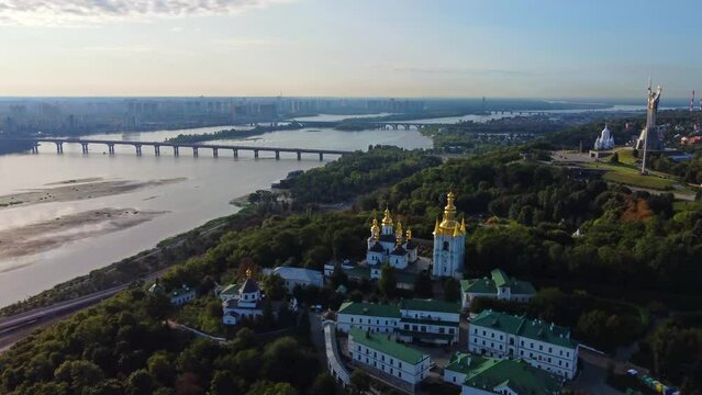 Kyivo-Pecherska Lavra and the Dnipro River , at sunrise time, taken with drone, Ukraine
