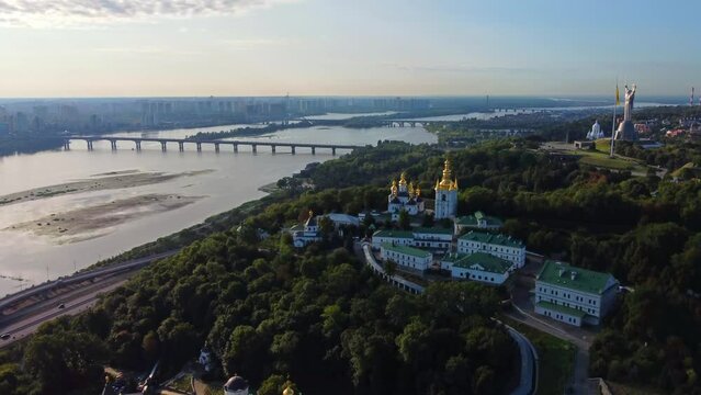 Kyivo-Pecherska Lavra and the Dnipro River , at sunrise time, taken with drone, Ukraine