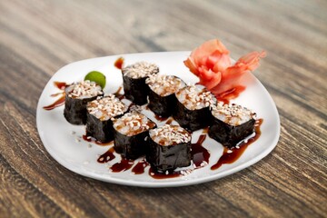 Tasty roll with salmon and cheese, Traditional delicious fresh sushi roll set. Sushi menu. Japanese kitchen, restaurant. Asian food