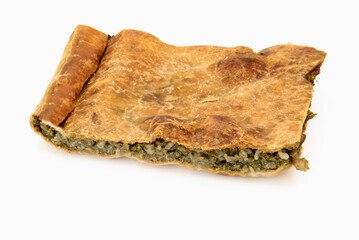 Slice green Ligurian cake, typical Italian savory pie from Liguria filled with zucchini and rice,...