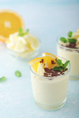 Orange lemon citrus milk mousse in glasses