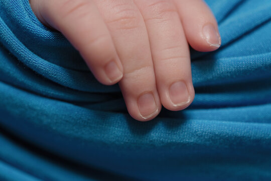 Macro photography of the newborn's hand