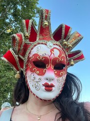 Carnival mask from the island of Mallorca - beautiful, in red colors on a woman, Japanese style