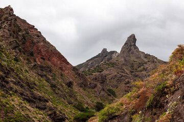 Panoramic view on El Dedo del Roque Pai crag, Roque Paez in the Anaga mountain range, Tenerife, Canary Islands, Spain, Europe. Scenic hiking trail from Afur to Taganana through canyon Barranco de Afur