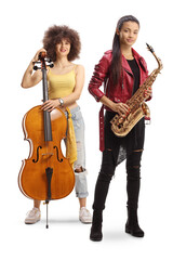 Young trendy female musicians with a cello and a sax posing and looking at camera