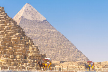 Obraz na płótnie Canvas A view of the pyramids at Giza, Egypt