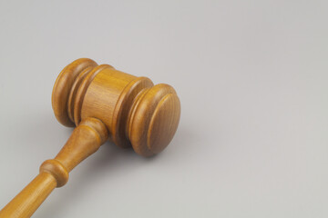 Judge's gavel on gray background, space for text