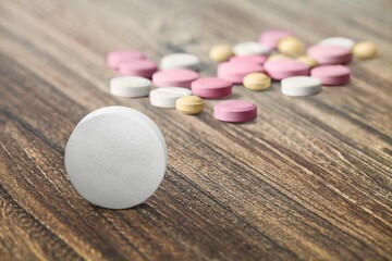 Set of pills drug on desk background