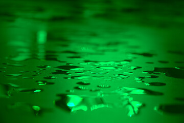 Water drops on table. Close up of a dew or melted ice, water condensation.