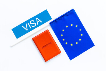 Flag of European Union with passport. Travel visa and citizenship concept