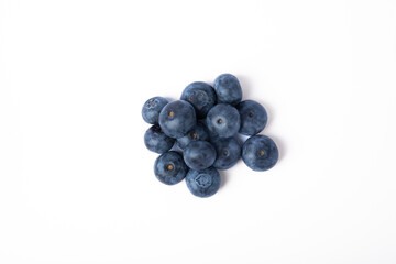 Blueberries isolated on a white background. Ripe and fresh blueberries. Vitamins. Healthy food. Juicy berry. Copy space. Place for text