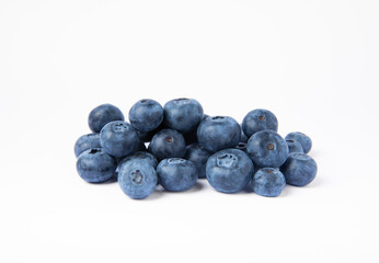 Blueberries isolated on a white background. Ripe and fresh blueberries. Vitamins. Healthy food. Juicy berry. Copy space. Place for text