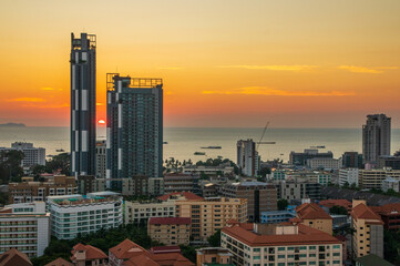 Obraz premium The Cityscape and the buildings of Pattaya District Chonburi Thailand Southeast Asia during the sunset time