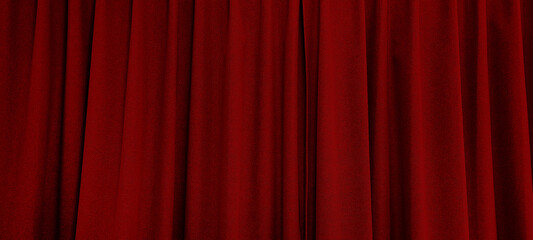 close up view of dark red curtain in thin and thick vertical folds made of black out sackcloth fabric, panoramic view of drapery use as background. abstract theatre backgrounds and wallpapers.