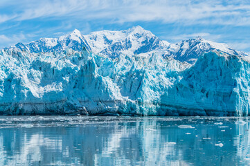 Reflections of the snout of the Hubbard Glacier into Disenchartment Bay in Alaska in summertime