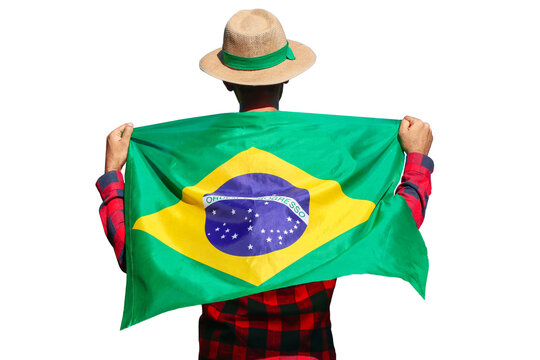 Farmer With Hat Holding Brazilian flag for Independence Day. Black Man Holding Brazil Flag isolated.