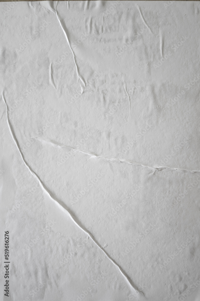 Poster blank white glued paper for poster texture overlay. crumpled and wrinkled pattern for background. ma