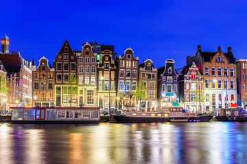 Fototapeta premium Amsterdam, Netherlands. Colorful dancing houses.